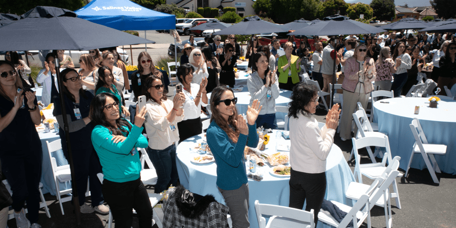 crowd applauding at nurse's week celebration