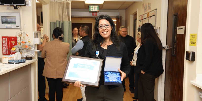 Claudia with STAR award