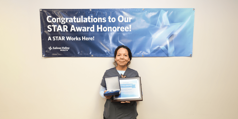 Dolores with STAR award